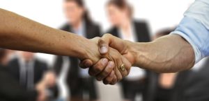 Choose a reliable moving company - man and woman shaking hands